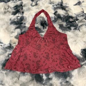 Red halter top with floral pattern and tie detail